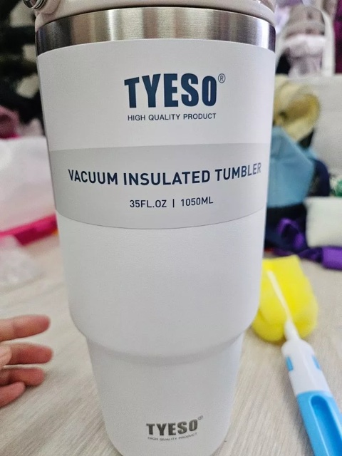 TYESO putih dengan berus pencuci