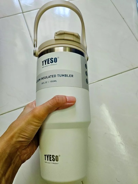 TYESO putih dipegang